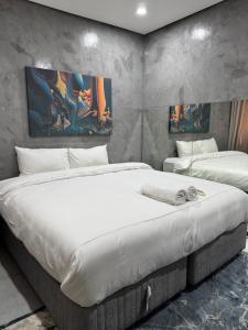 En eller flere senge i et værelse på Bras boutique