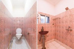 Koupelna v ubytování Collection O Kalighat Metro Station Formerly RM Guest Home