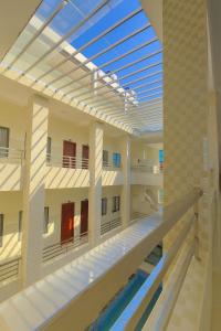 an internal view of a building with a swimming pool at Bảo Lộc Hotel Lagi in La Gi