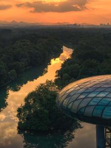 an aerial view of a river with a dome at XIN HOTEL in Hangzhou