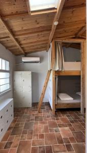 Postel nebo postele na pokoji v ubytování 都蘭小星民宿 Dulan Star Guest House