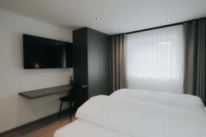 Postel nebo postele na pokoji v ubytování Apart Kraxner