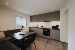 Kuchyň nebo kuchyňský kout v ubytování Apart Kraxner