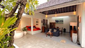 Posezení v ubytování The Decks Bali