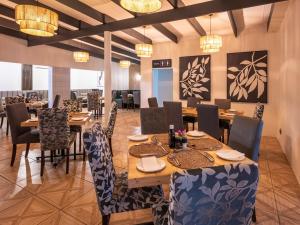 Un restaurant sau alt loc unde se poate mânca la ANEW Resort White River Mbombela