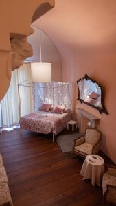 Postel nebo postele na pokoji v ubytování Mondovì Ridente