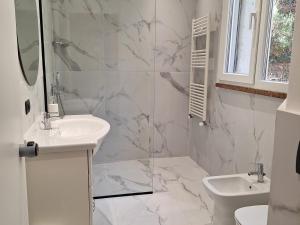 Koupelna v ubytování Pace e relax Riva del Garda + 15 fotografií