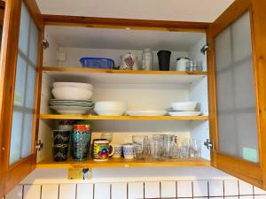 Una cocina o kitchenette en Balázs Guesthouse - in a green area, with our own garden - next to Metro 4 station