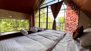 En eller flere senge i et værelse på Era Resort Slope Stay + 105 billeder