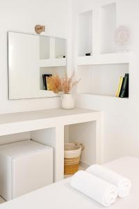 Una cama o camas en una habitación de Erice Fira