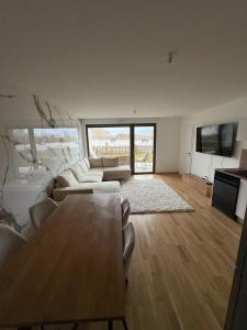 Телевизор и/или развлекательный центр в Apartment Cosy