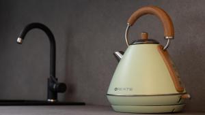 a tea kettle is sitting on a kitchen counter at Zardin 7 in Valdidentro