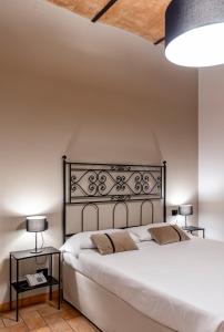 Postel nebo postele na pokoji v ubytování Hotel San Marco