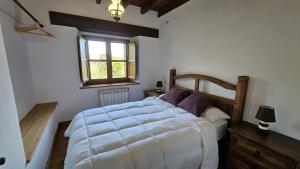 Ένα ή περισσότερα κρεβάτια σε δωμάτιο στο El Rincon del Castro