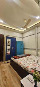 En eller flere senge i et værelse på Welcome Homestay