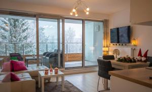 Et opholdsområde på Apartment Mountain Panorama