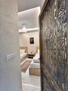 Postel nebo postele na pokoji v ubytování itri house