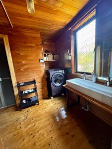 a bathroom with a sink and a washing machine at カタツムリ in Shiogama +85 photos