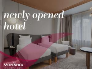 Giường trong phòng chung tại Mövenpick Hotel Budapest Centre