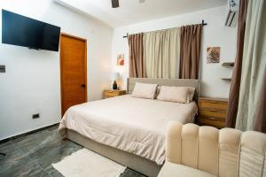 Φωτογραφία από το άλμπουμ του Casa moderna cerca de Casa de Campo con Wi-Fi profesional y espacio para 8 personas σε La Romana