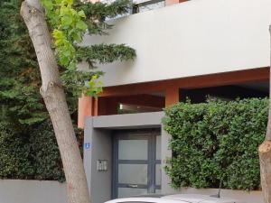 a house with a door and a tree at Mary's vintage house in Athens