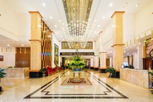 a lobby of a hotel with a large building at Ladalat Hotel in Da Lat +202 photos