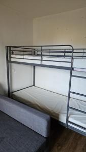 a couple of bunk beds in a room at Val Thorens - Ski InOut - 4 Beds Flat C-E19 in Béranger