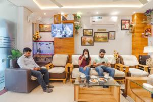 Huéspedes de FabHotel Holiday Grand