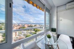 En balkon eller terrasse på Modern Apartment in the Beach Area