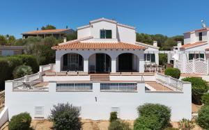 an aerial view of a white house at Villa Anita in Santo Tomás