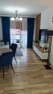 Μια τηλεόραση ή/και κέντρο ψυχαγωγίας στο Lux Apartment parking gratis