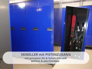 a blue cabinet with a snowboard in it at FeWo Schwarzwaldschick Feldberg I Direkt an der Piste I Whirlwanne I Tiefgarage I Skipass vergünstigt in Feldberg +105 photos