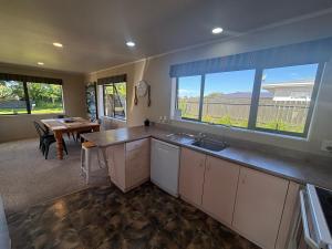 Kuchyň nebo kuchyňský kout v ubytování Summer Family Escape