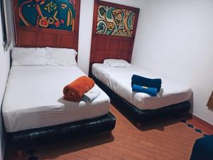 Voodi või voodid majutusasutuse Hotel Cafe Real toas