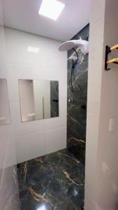 Ένα μπάνιο στο Aconchego de Lugar - Eri & Douglas +9 φωτογραφίες