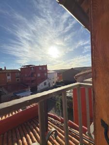 a view of a city from a balcony at Cielos de Celadas in Celadas