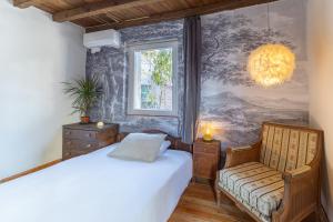 Ένα ή περισσότερα κρεβάτια σε δωμάτιο στο Relax En Casona Única Lanueva +38 φωτογραφίες