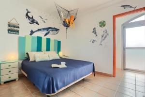 En eller flere senge i et værelse på Casa Dolly + 30 billeder