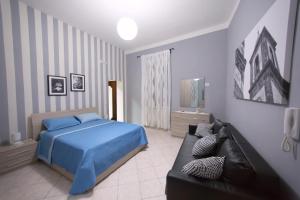 Posteľ alebo postele v izbe v ubytovaní Giualduomo B&B