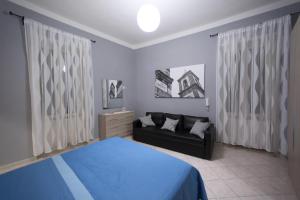 Letto o letti in una camera di Giualduomo B&B