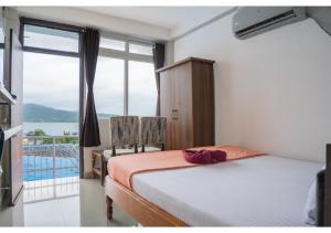 Postel nebo postele na pokoji v ubytování Ocean View