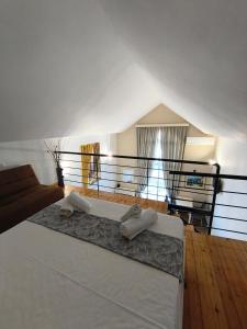 Postel nebo postele na pokoji v ubytování Ilios Mare Hotel