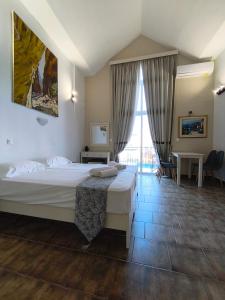 Postel nebo postele na pokoji v ubytování Ilios Mare Hotel