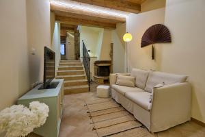 Un televizor și/sau centru de divertisment la Casa Vicolo TerminIO