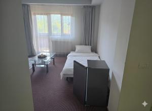 Ένα ή περισσότερα κρεβάτια σε δωμάτιο στο Cornu Complex MEM +27 φωτογραφίες