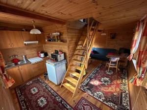 Η κουζίνα ή μικρή κουζίνα στο Domek z bala Mazury