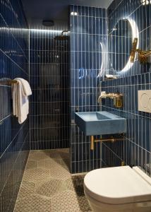 Koupelna v ubytování Hotel 1904