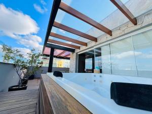 En balkon eller terrasse på Galapagos1402 - Cobertura com Hidro e Jacuzzi Privativas