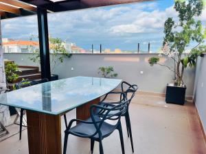 En balkon eller terrasse på Galapagos1402 - Cobertura com Hidro e Jacuzzi Privativas