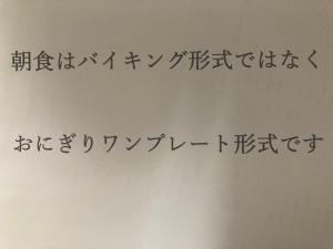 a group of writing on a wall at Hotel Abest Kochi in Kochi